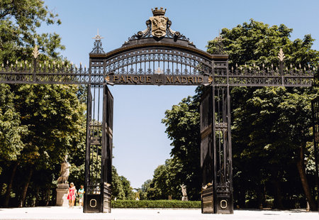 Entrance through the gate into the Parque del Buen Retiro Park in Madrid, Spain