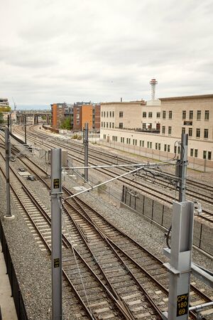 Train tracks near Union Station, under the Millennium Bridge in the Riverfront Park neighborhood of Denver, Coloradoのeditorial素材