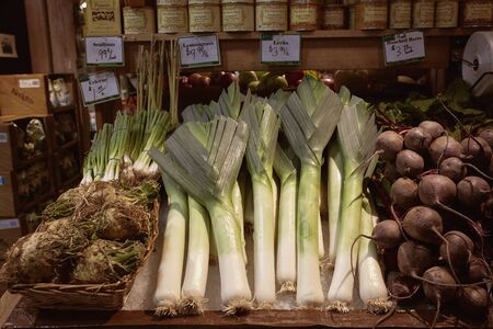 Woodstock, Vermont - September 30th, 2019: Leeks, celeriac, and beets for sale at a local farmers market in Woodstock, Vermont.のeditorial素材