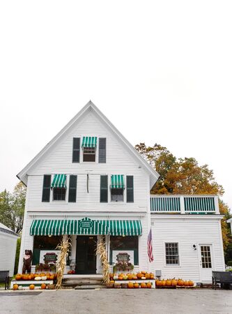 Dorset, Vermont - October 1st, 2019:  Exterior of Dorset Union Store decorated with seasonal Fall pumpkins on the front porchのeditorial素材