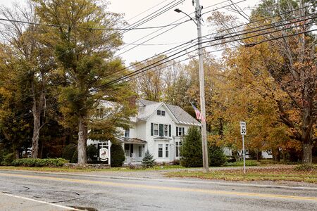 Dorset, Vermont - October 1st, 2019:  Bed and Breakfast surrounded by foliage on a cold, Fall day in the New England town of Dorset.のeditorial素材