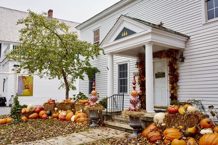 Dorset, Vermont - October 1st, 2019:  Exterior of 3 Pears Gallery decorated with seasonal pumpkins and Fall decorations.のeditorial素材