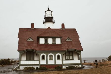 Cape Elizabeth, Maine - September 26th, 2019: Portland Head Lighthouse Museum on a cold and stormy Fall day in Cape Elizabeth, Maine.のeditorial素材