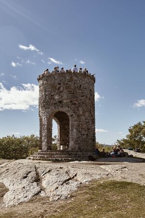 Camden, Maine - September 26th, 2019: Tourists on top of observation tower overlooking Mount Battie in Camden Hills State Park, Maineのeditorial素材