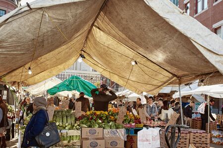 Boston, Massachusetts - October 3rd, 2019: People shopping for fresh produce at Boston's open air Haymarket in downtown Boston.のeditorial素材