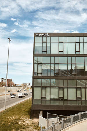 Denver, Colorado - May 1st, 2020:  Exterior of co-working space, WeWork overlooking I-25 highway, in the LoHi neighborhood of Downtown Denver.のeditorial素材