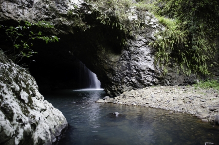 Natural Arch, Gold Coast, Australia, Arched cave with waterfall, outside viewの写真素材