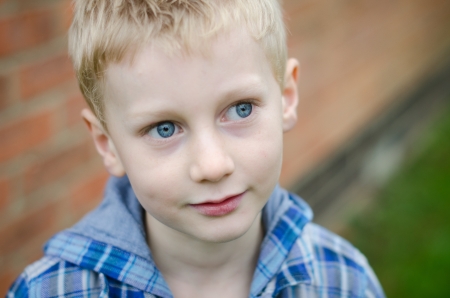 Thoughtful child colourの写真素材