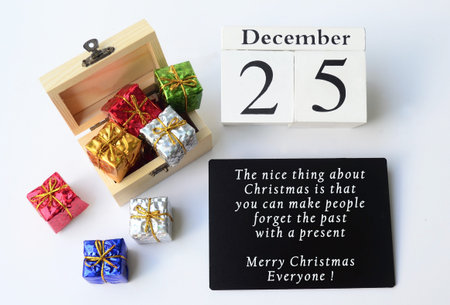 Image for Christmas greeting with cube block and Christmas decoration background. Merry Christmas...