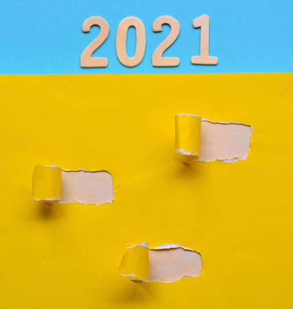 Blank and colorful torn paper with Year 2021 background. Happy New Year 2021 Concept