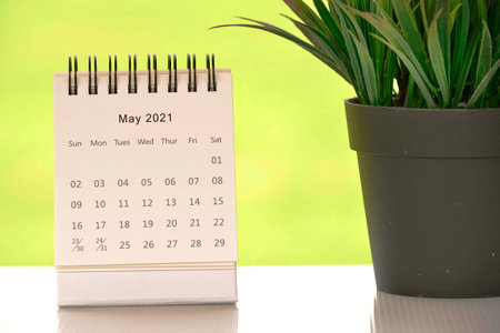 White May 2021 calendar with green backgrounds and potted plant. 2021 New Year Conceptの写真素材