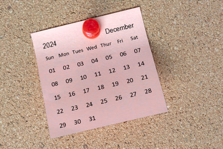 December 2024 calendar on sticky note. Reminder and message concept. 2024 new year concept.の写真素材