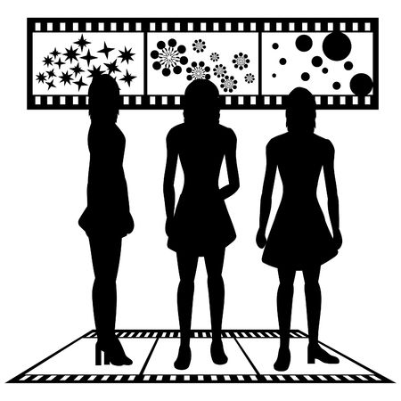 Silhouettes of women with film strip backgroundの写真素材