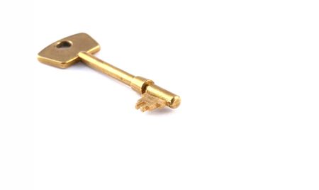 Macro view of a key on a white backgroundの写真素材