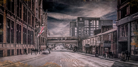 City industrial area with road and rail and a variety of old buildings Manchester  created to be intentional gritty, faded and retro look with trademarks removed or changedのeditorial素材