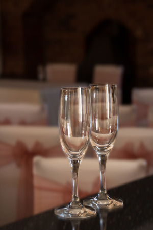 Pair of wine glasses ready for a celebration, but emptyの写真素材