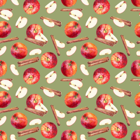 Seamless pattern with apples, slices and cinnamon sticks on green background. Hand painted in watercolor.の写真素材