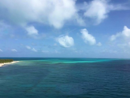 Blue Sea and White Sandの写真素材