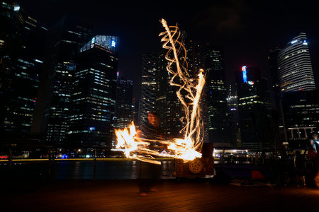 SINGAPORE - MAR 9  Fire Dancers street performance at Marina Bay on Mar 9, 2014 in Singapore 