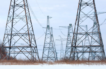 High-voltage columns against the sky