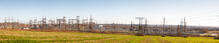 Panorama High voltage power substation  against  blue sky