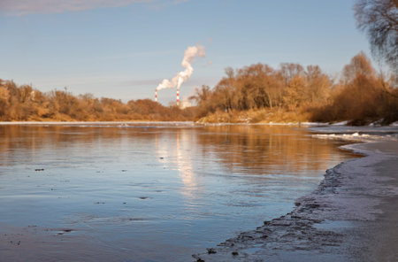 crust of ice covering  river in frosty day