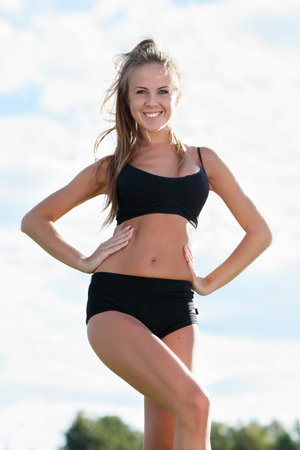 beautiful woman with perfect  body doing core workout
