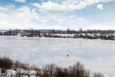 frozen river in winter dayの写真素材