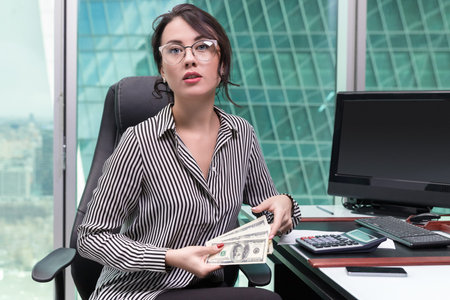 portrait of  girl office worker in skyscraper interior