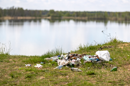 A lot of garbage at the tourist destination on the lakeの写真素材