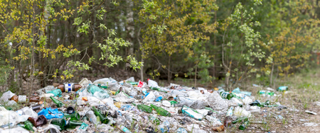 recycle bin and garbage on ground, nature scene landscapeの写真素材