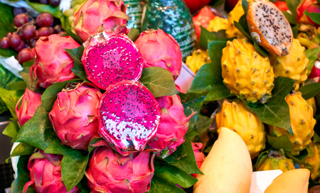 Fresh fruits in the market. Exotic fresh fruits on a market,papaya, dragon fruit,passion fruit.の写真素材