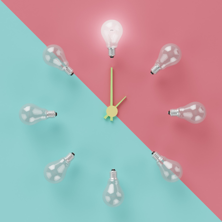 light bulbs glowing one different idea clock concept on cross pastel pink and light blue background , minmal concept , top view , flat layの写真素材