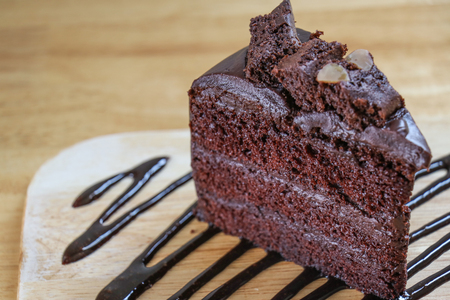 Piece of Chocolate Fudge on wooden table.の写真素材