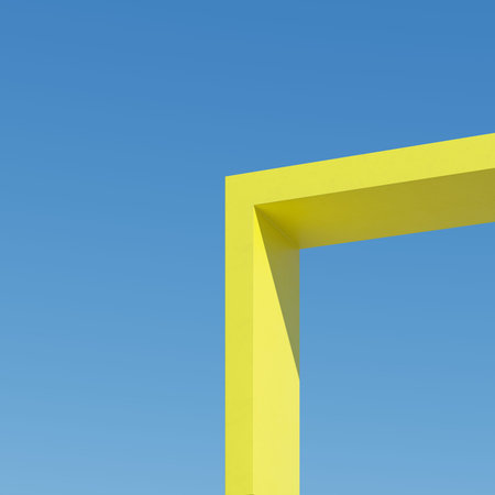 Yellow shape straight building with shadows on sky background. Minimal architecture Ideas concept....