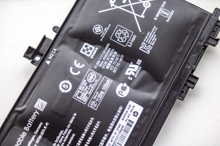 Heidelberg, Germany - August 02, 2019: Replacement of a defect, bloated HP Notebook Lithium-ion...