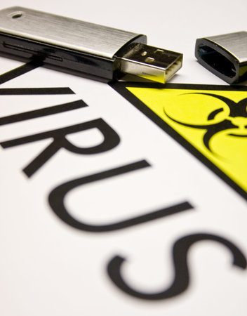 USB stick with virus sign and warning text
