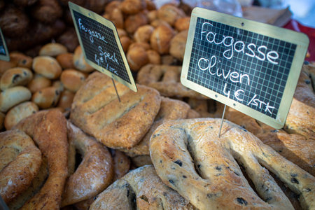 Neckargemuend, Germany: September 6, 2019: various breads exhibited at a gourmet market with French productsのeditorial素材