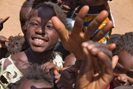 Smiling african kids in a small Gambian villageのeditorial素材