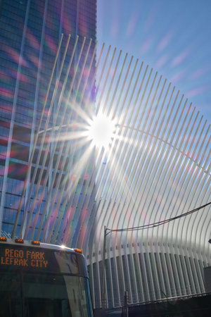 Sun breaks through urban city train station
