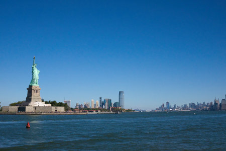 NEW YORK - CIRCA SEPTEMBER, 2017: Since 1886 Miss Liberty watches over the cityのeditorial素材