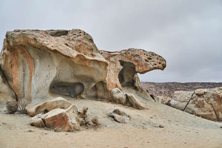 very special, strange and unique looking rock formation in the dry and arid desert landscape of the Atacama desert in northern Chile, South Americaの写真素材
