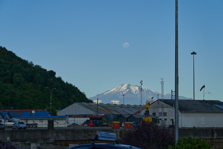 Osorno Volcano with full moon above, viewed from Puerto Montt, Patagonia, Chile, South Americaのeditorial素材