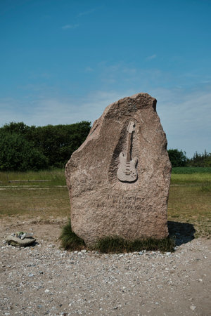 Jimi Hendrix Memorial stone Fehmarn Island, Germany showing a guitar, erected after a festival in 1970 shortly he diedのeditorial素材