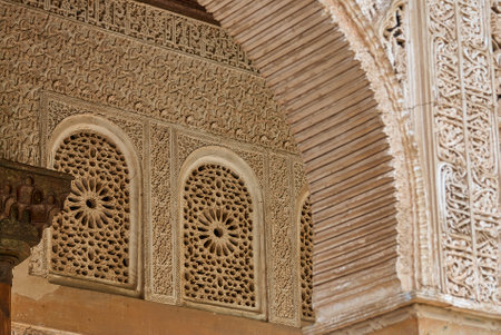 Granada, Spain - 06 11 2014: ornamental details of the artful moorish castle of Alhambra Palace in Granada Spain, a Unesco world heritageのeditorial素材