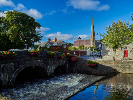 Cityscape of an Irish town on a sunny day with clear blue sky.のeditorial素材