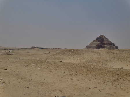 small step pyramid in the dry and arid desert of Egypt.の写真素材