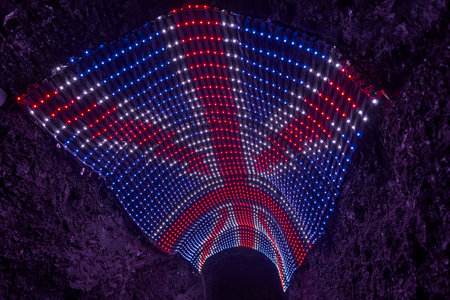 Zipaquira, Colombia - 04 12 2019: Illuminated union jack, Great Britain flag, at catholic cathedral of Zipaquira is built into the tunnels of an underground salt mine and artfully illuminated in colorful light.のeditorial素材