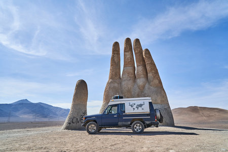 Antofagasta, Chile - 02 16 2019: Mano del desierto, a giant sculpture of a hand with fingertips reaching to the sky. located at the panamericana close to antofagasta in the atacama desert, chile.のeditorial素材