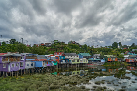 Colorful palafitos, traditional wooden stilt houses in Castro on the island Chiloe, Chile, South Americaのeditorial素材
